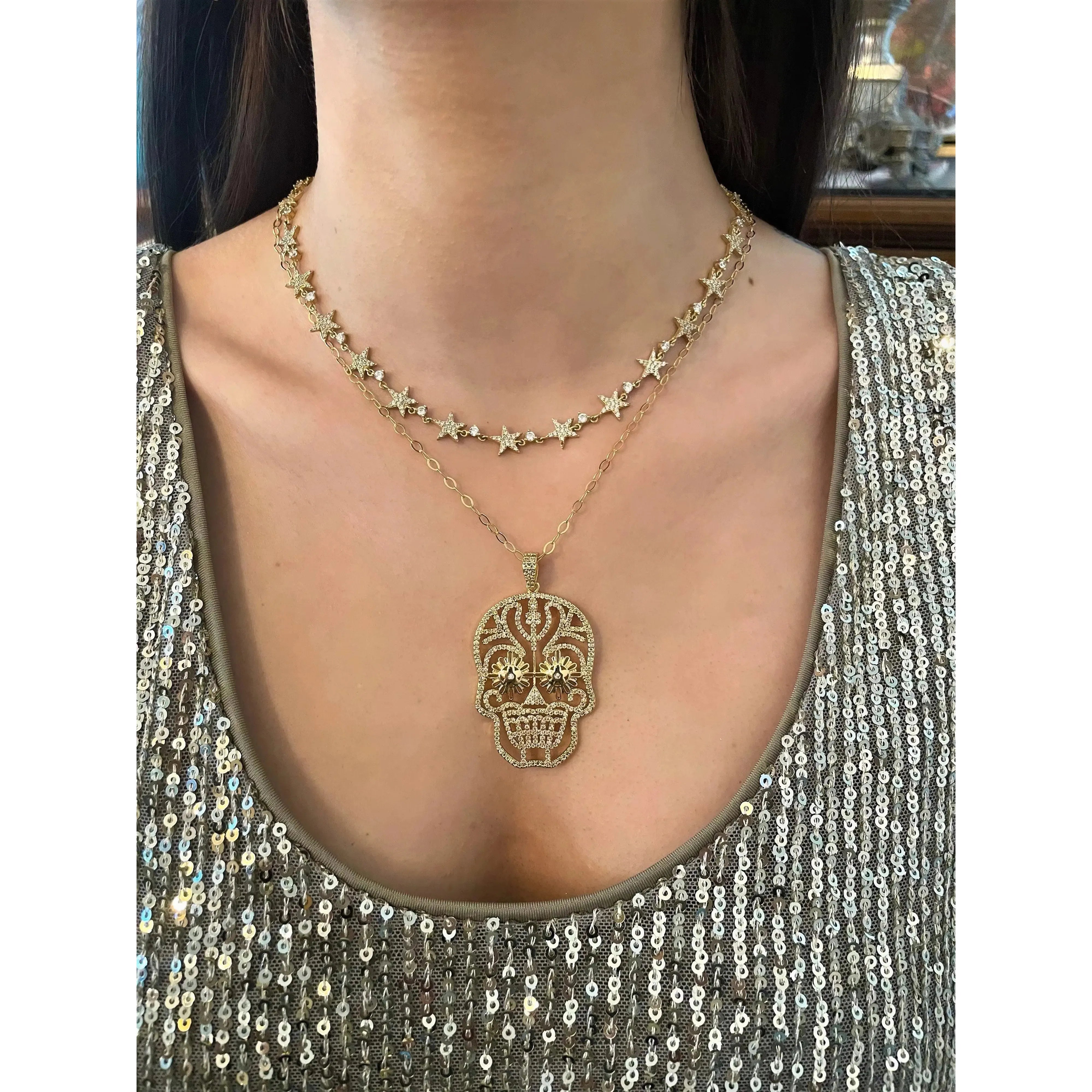 daisy eyes skull necklace -gold