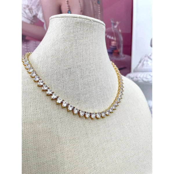 Sweet Seduction gold necklace with white CZ crystals on 18k yellow gold over stainless steel, 16-inch hypoallergenic chain.