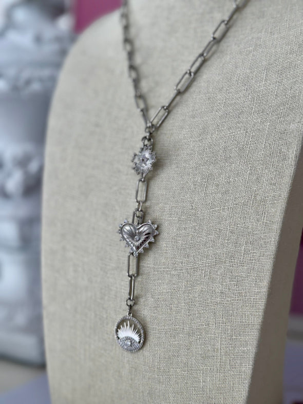 Silver Verona Lariat Necklace with cubic zircon crystal, North Star, Evil Eye, and spiked heart charms on adjustable chain