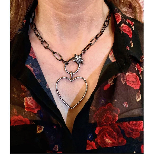 Open Heart - Black necklace with gunmetal chain and crystal star clasp worn on neck